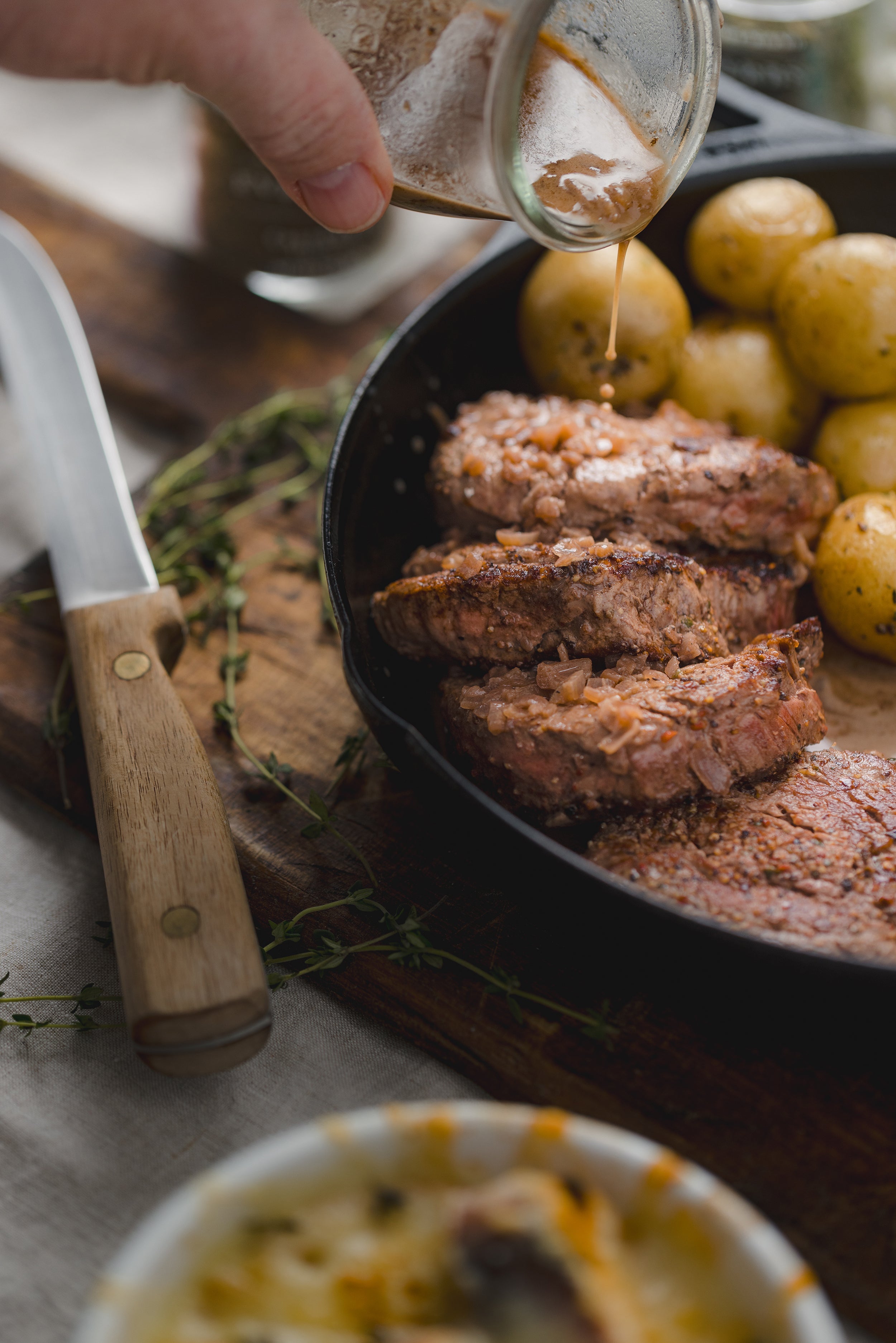 Steak Au Poivre with Red Wine Sauce and Herb Roasted Potatoes